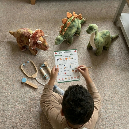 Child playing pretend vet